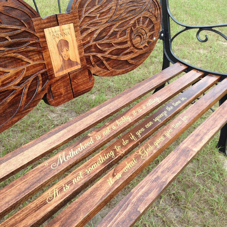 View of quote on seat of bench.